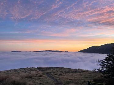 view of sunrise from bushline hut in the nelson lakes national park